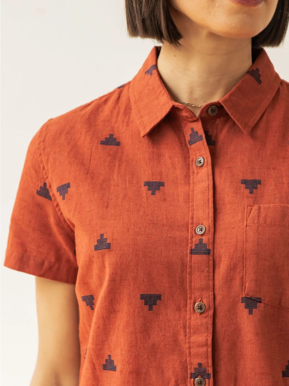 Women's Rust-Orange Short Sleeve Button-Down Shirt with Navy Motif